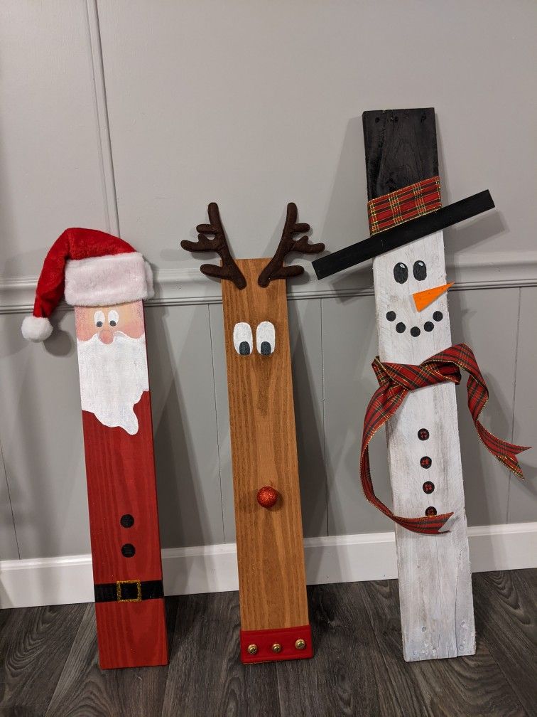 idee di personaggi in legno per decorare il giardino a Natale